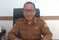 Foto: Kepala BPKAD Lotim H.Hasni. M.,Ak